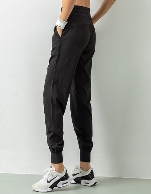 Load image into Gallery viewer, Stay Active in Comfort: Women&#39;s Casual Sports Pants with Loose Legs, Drawstring High Waist, and Pockets - Perfect for Running, Gym, and Yoga Fitness
