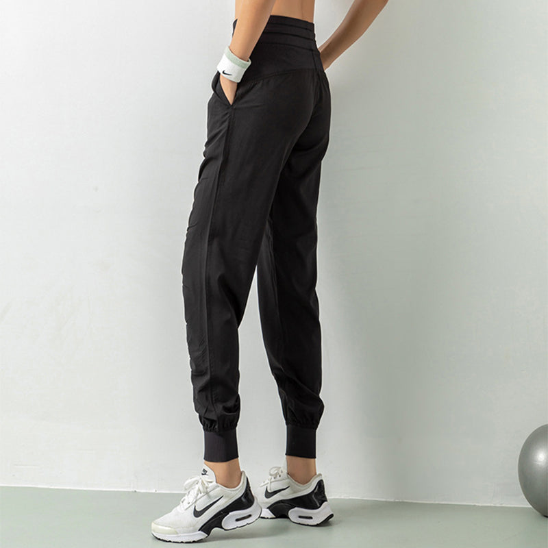 Stay Active in Comfort: Women's Casual Sports Pants with Loose Legs, Drawstring High Waist, and Pockets - Perfect for Running, Gym, and Yoga Fitness