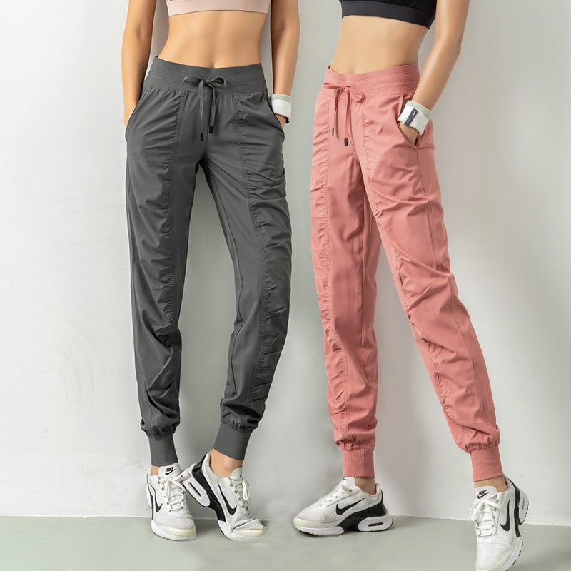 Stay Active in Comfort: Women's Casual Sports Pants with Loose Legs, Drawstring High Waist, and Pockets - Perfect for Running, Gym, and Yoga Fitness