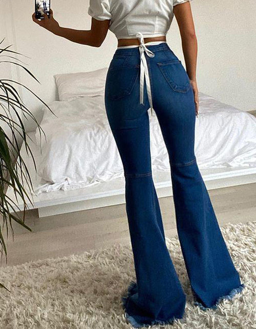 Load image into Gallery viewer, Effortlessly Edgy: Colored Stretch Denim Trousers with Ripped Frayed Flared Hem - Elevate Your Look with Trendy Distressed Details Blue
