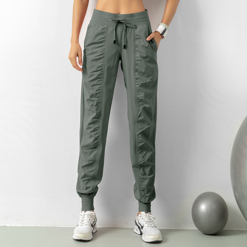 Stay Active in Comfort: Women's Casual Sports Pants with Loose Legs, Drawstring High Waist, and Pockets - Perfect for Running, Gym, and Yoga Fitness