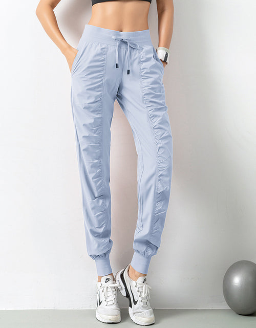 Load image into Gallery viewer, Stay Active in Comfort: Women&#39;s Casual Sports Pants with Loose Legs, Drawstring High Waist, and Pockets - Perfect for Running, Gym, and Yoga Fitness Blue
