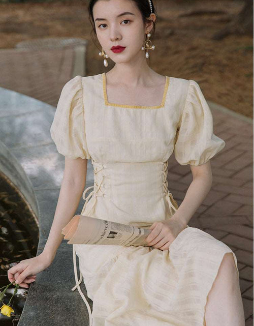 Load image into Gallery viewer, Light Yellow Chiffon Temperament Commute Style Fishtail Skirt Puff Short Sleeve Square Collar Lady Retro Waist-controlled Self-tie Dress
